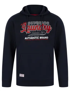 Clarence Graphic Motif Brushback Fleece Pullover Hoodie in Sky Captain Navy - Tokyo Laundry