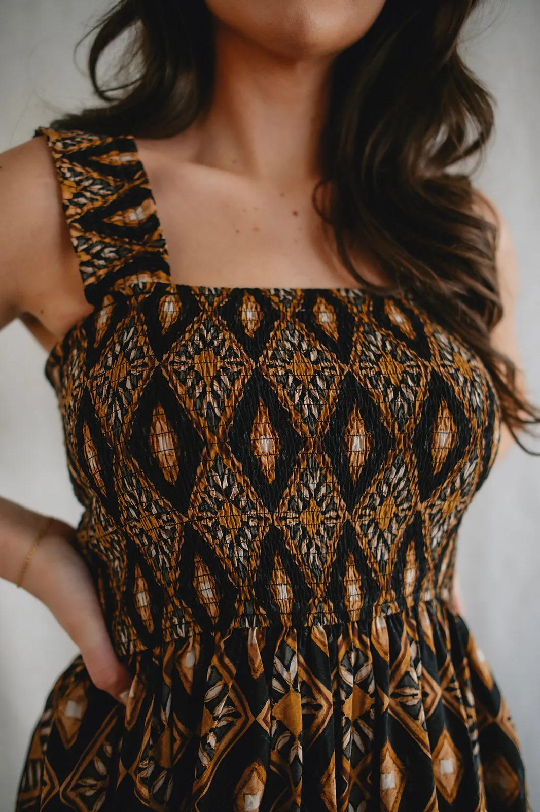 The Geometric Smocked Midi Dress